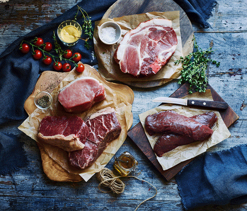 Lots of different game meats arranged on a platter