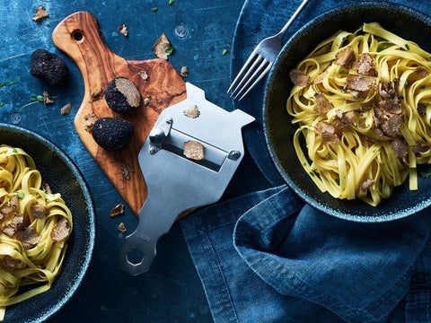 Truffle grated onto pasta