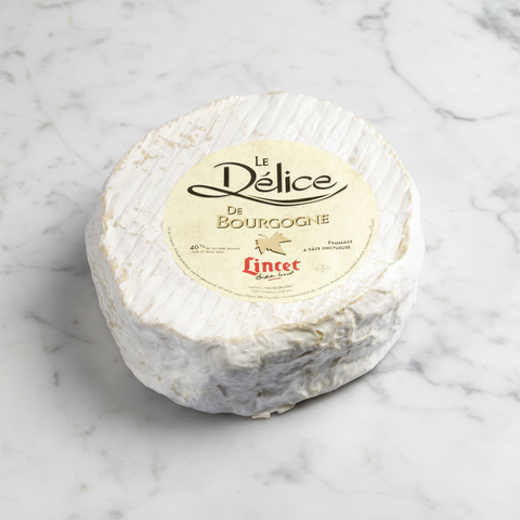 Delice de Bourgogne on white marble