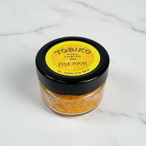 Yuzu Tobiko on White Marble